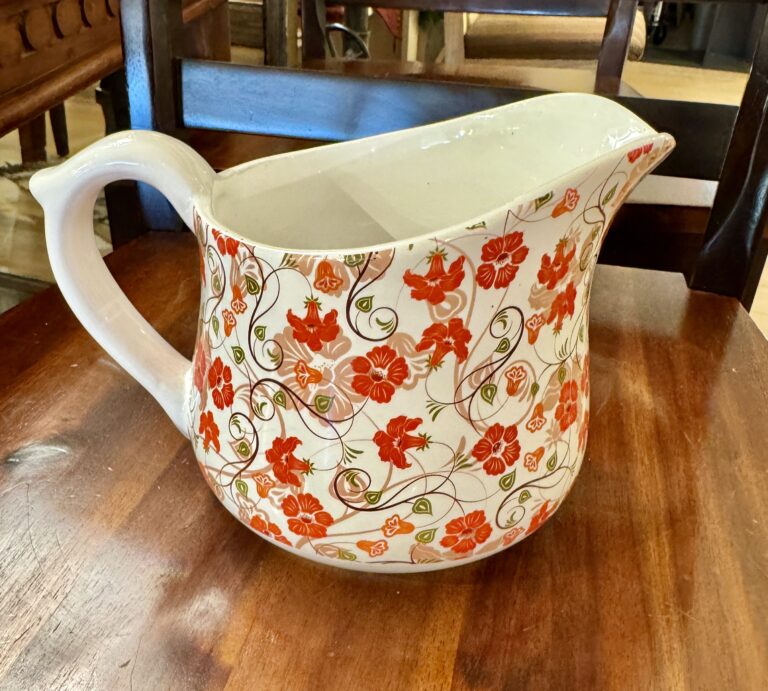 Floral ceramic pitcher