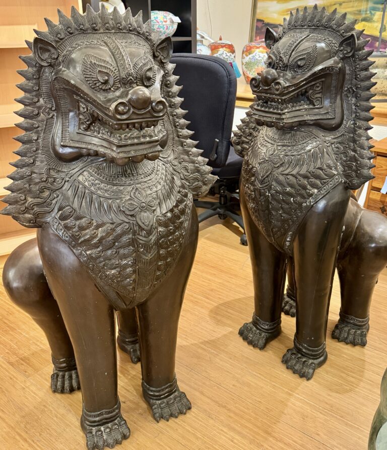 Antique temple lion statues